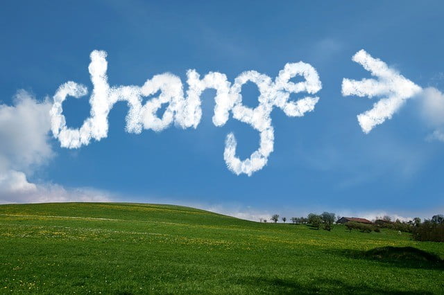 The word "change" in white letter in blue sky representing why change is important in our life