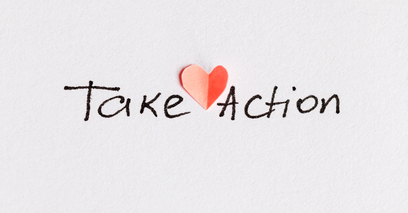 Handwritten phrase "take action" depicting the importance of taking action towards your goals for improved self-esteem