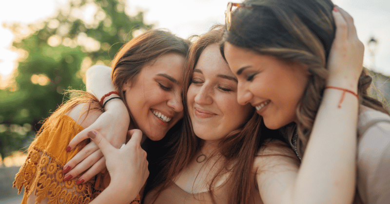 Girls embracing: sharing goals with the right people