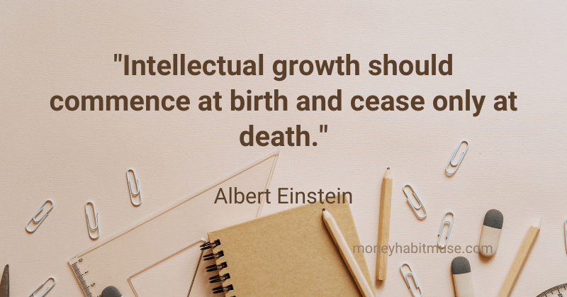 Notebook, pencils and paper clips and Albert Einstein quote about life long learning: a habit to become a better person