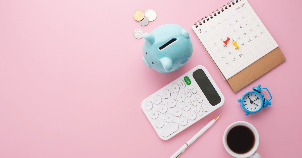 Piggybank, calculator, calendar, clock, and coins, symbolising financial management, reflecting the sentiment 'I have a hard time saving money'