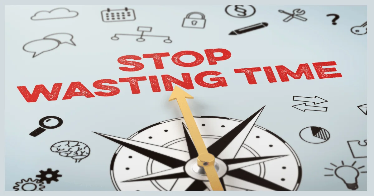A compass pointing to Text STOP WASTING TIME